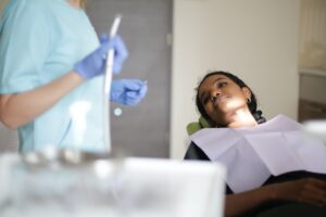 patient laying on the dental chair waiting for treatment