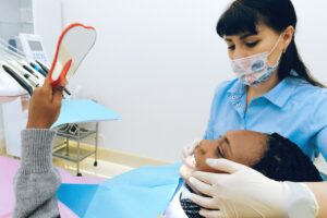 dentist preparing patient for root canal